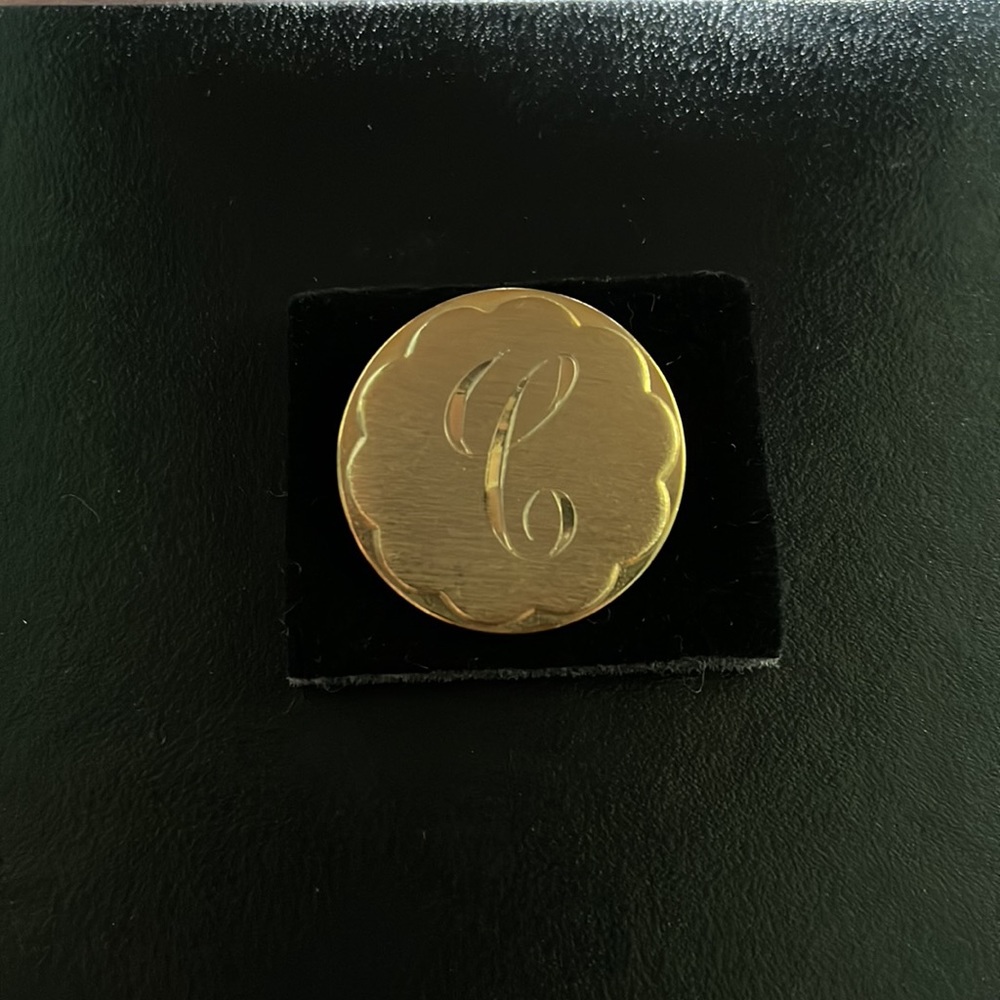 Vintage engraved C brooch